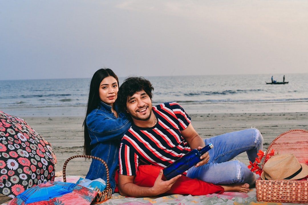 happy indian couple reading